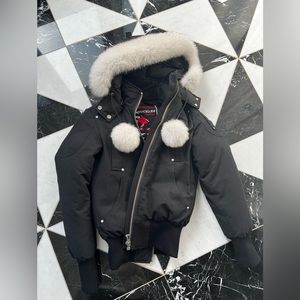 Super warm Moose Knuckles Puffer Bomber is Jacket.